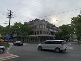 Cars moving on road during cloudy day - shot by iPhone XR