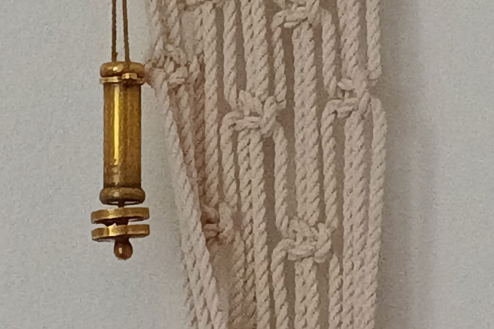 A 8x zoom closeup of an image of macrame A 8x zoom closeup of an image of macrame