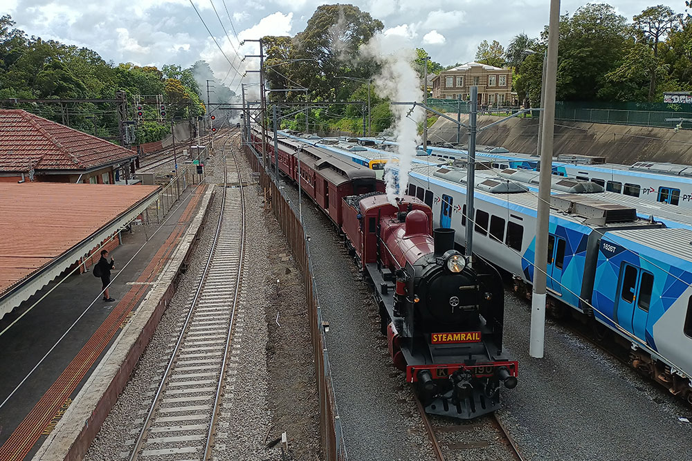 Image of steam train from above a station Image of steam train from above a station