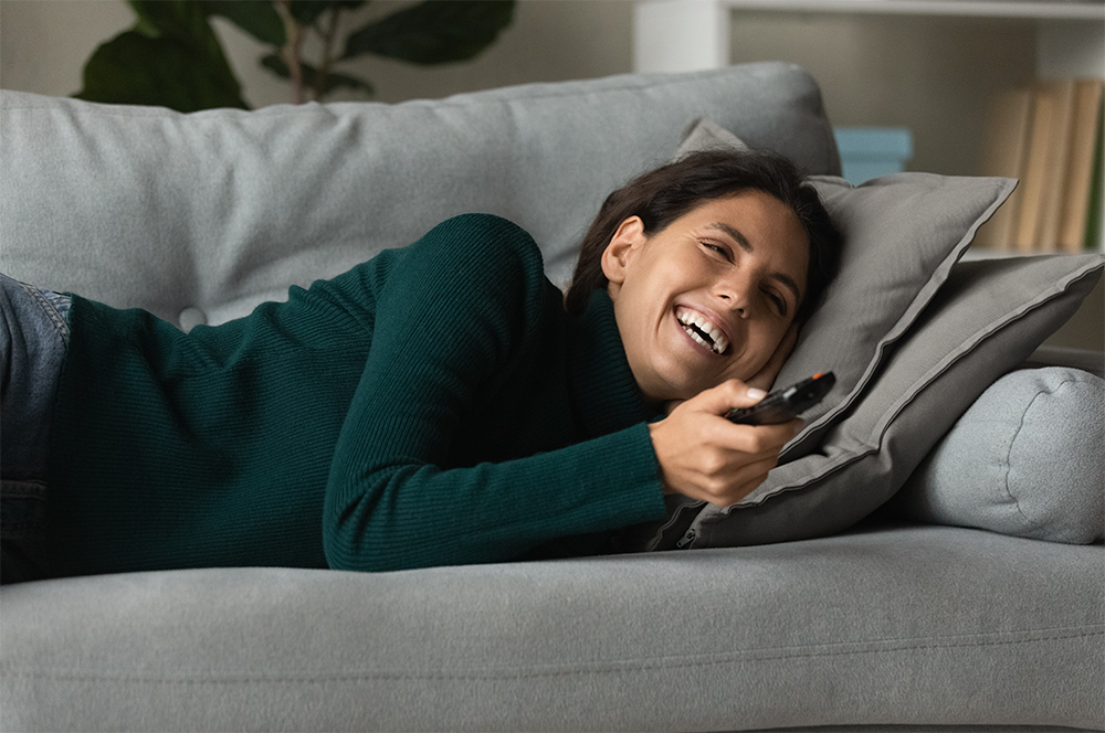 person in front of TV person in front of TV
