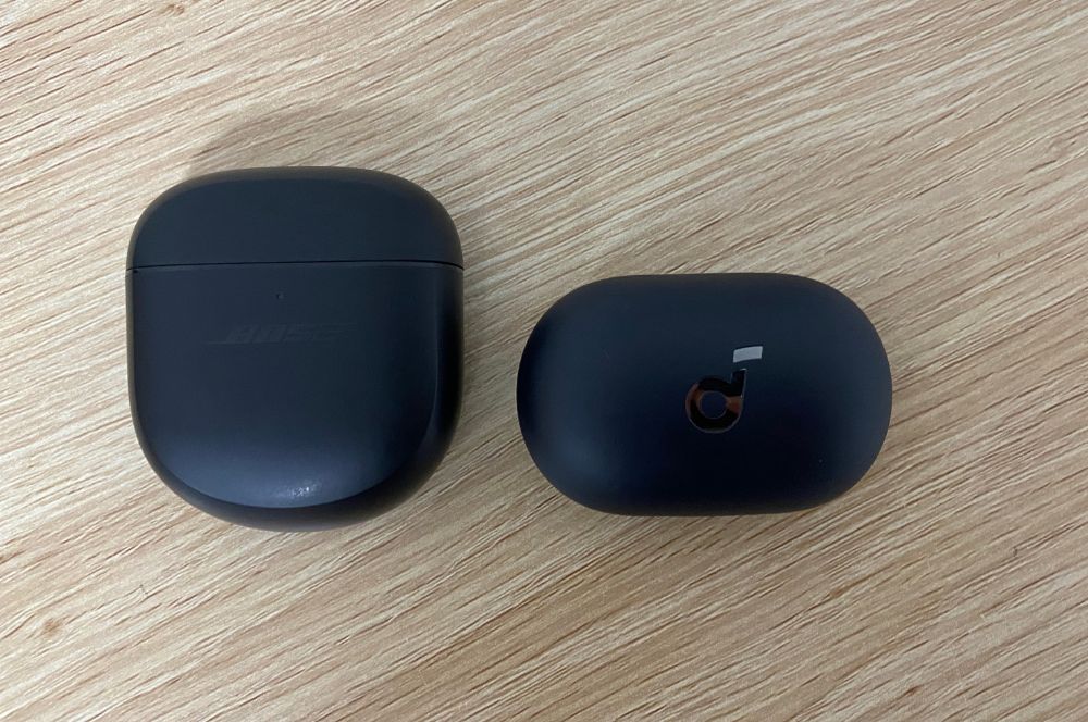 Bose QuietComfort II earbuds case compared to Soundcore Space A40 case Bose QuietComfort II earbuds case compared to Soundcore Space A40 case