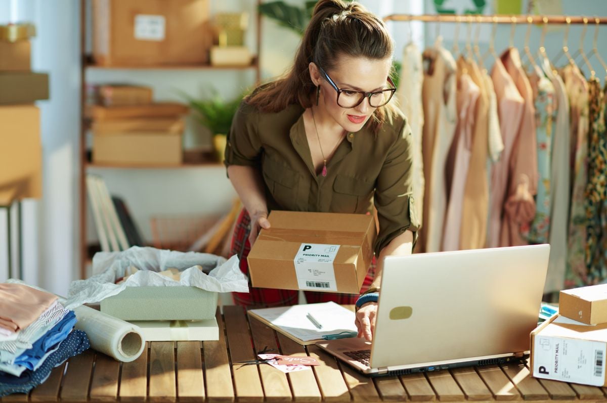 Small business owner packaging parcels Small business owner packaging parcels