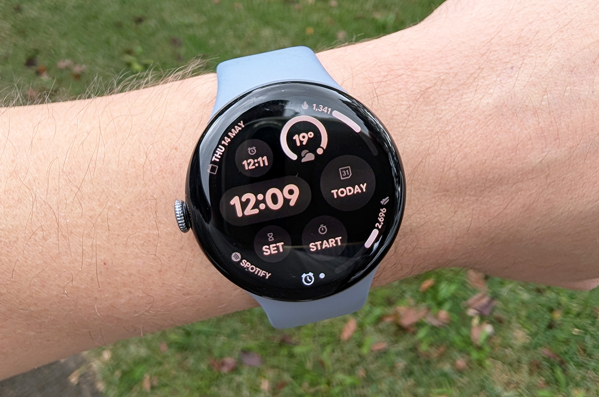 A smartwatch home screen displaying various satistics A smartwatch home screen displaying various satistics