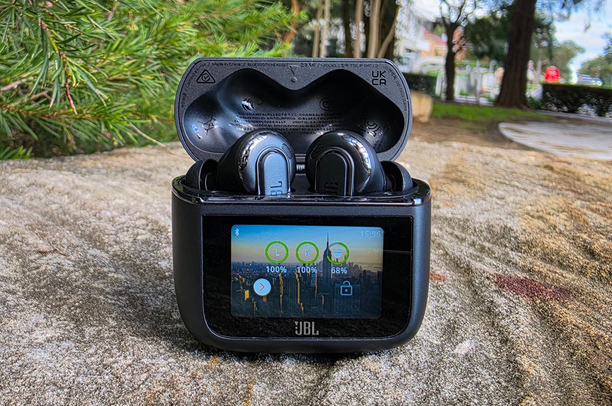 JBL Tour Pro 3 earbuds on a rock JBL Tour Pro 3 earbuds on a rock