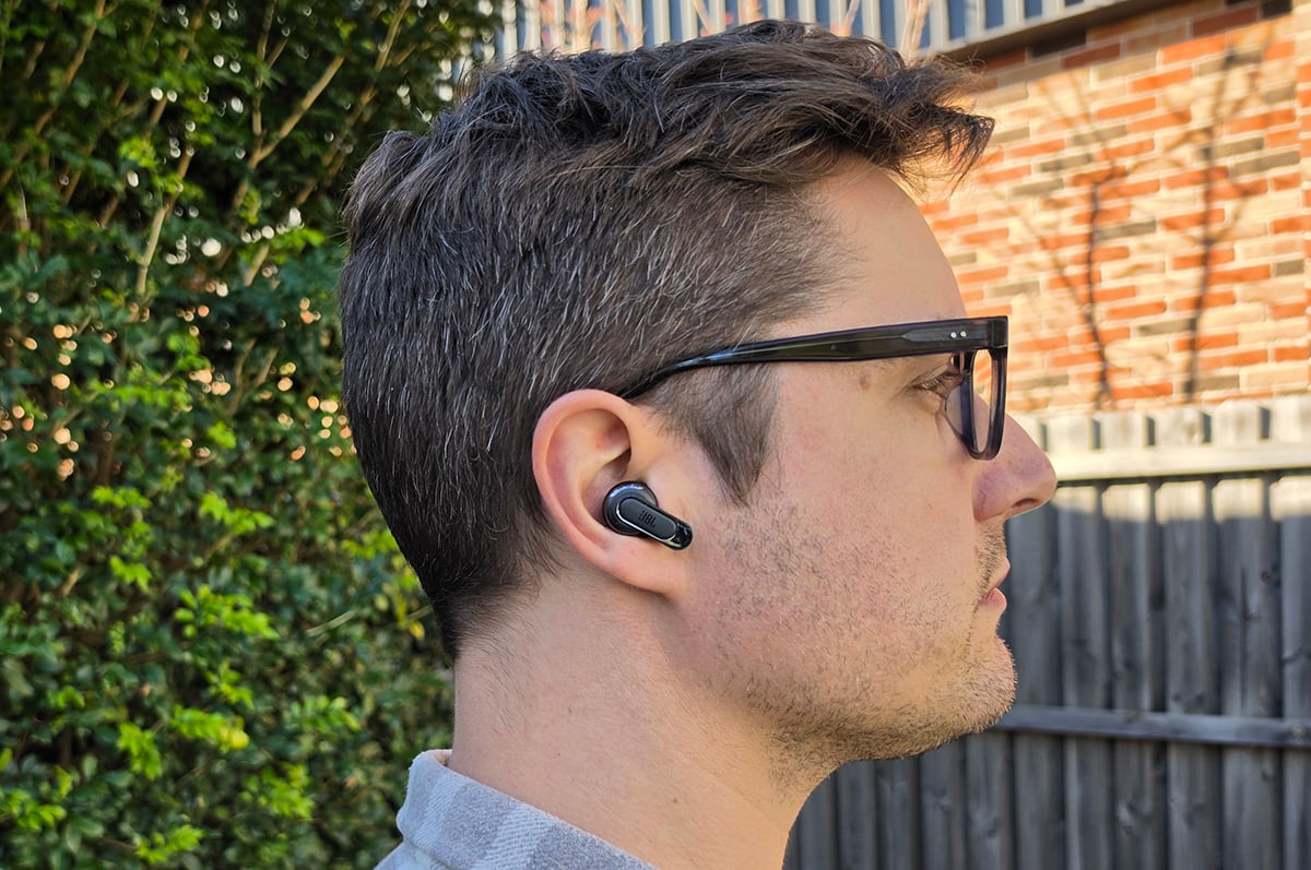 Tour Pro 3 earbuds worn in ear Tour Pro 3 earbuds worn in ear